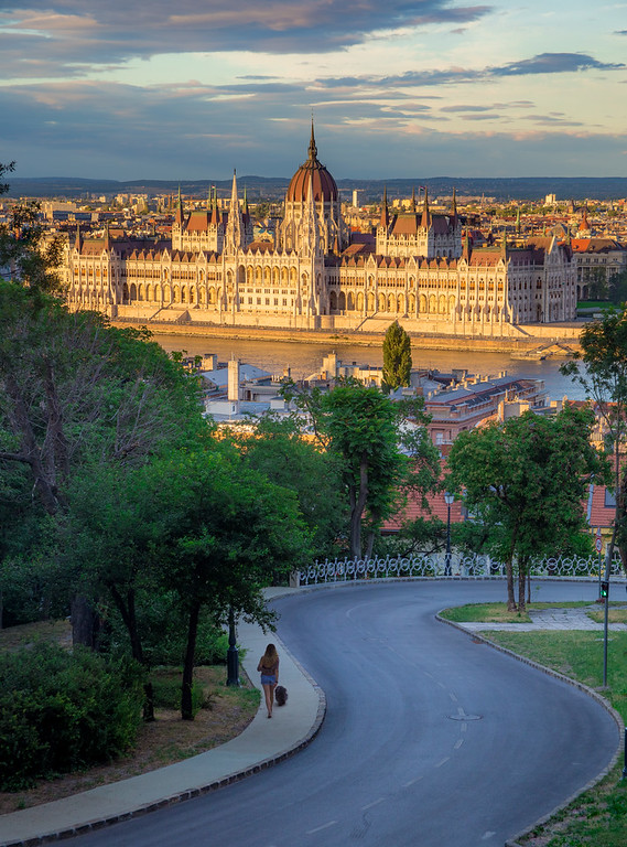 Parliament in the sunset from Fishermens bastion with dog walkin