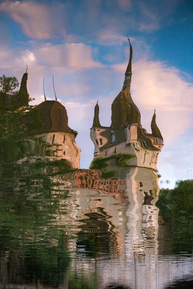 Vajdahunyad reflection warped castle